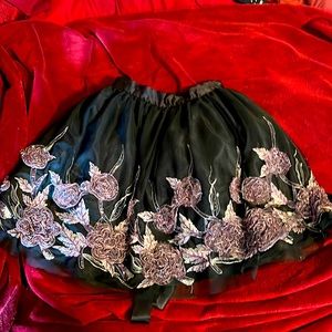 Precious little black skirt